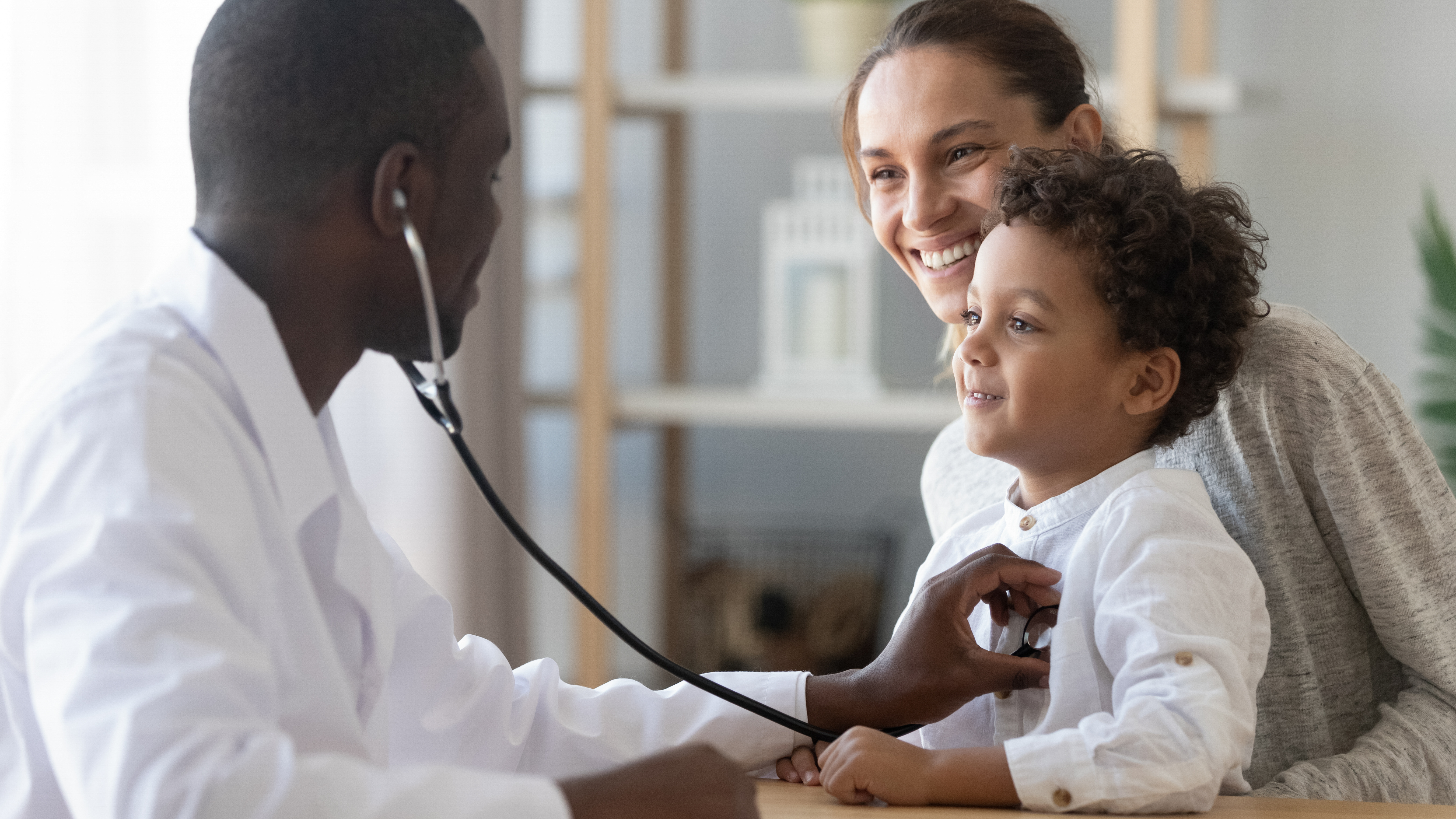 child receiving health care from a doctor