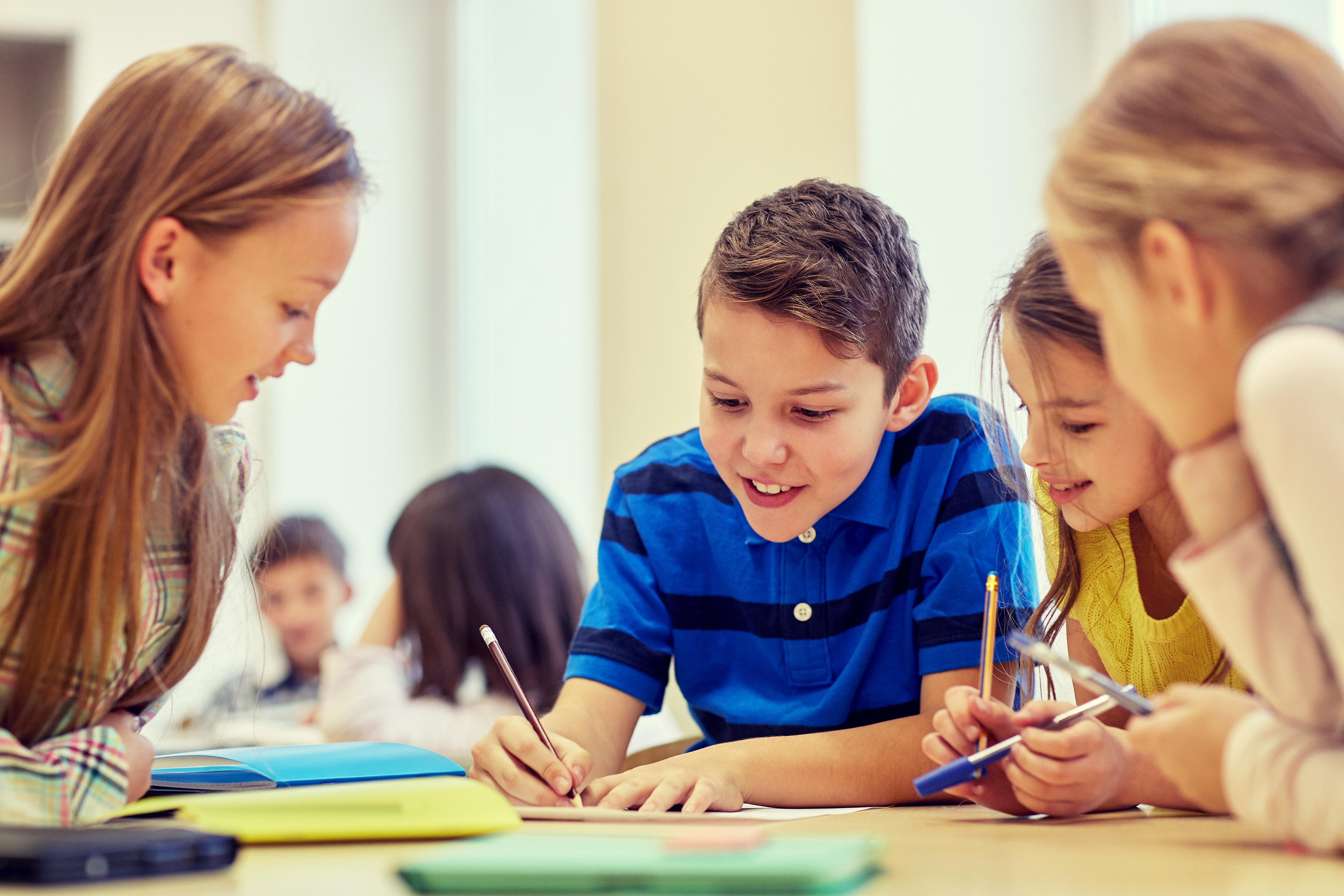 children learning in a classroom